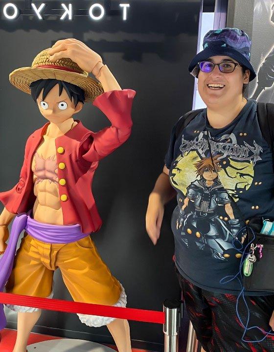 Thalia Guardarrama stands next to 3-D anime character